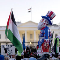 Demonstrators rally during the March on Washington for Gaza near the White House in Washington, January 13, 2024. (AP Photo/ Jose Luis Magana)