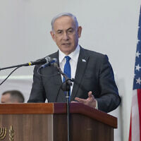 Prime Minister Benjamin Netanyahu speaks during a gathering of Jewish leaders at the Museum of Tolerance in Jerusalem, February 18, 2024. (AP Photo/Ohad Zwigenberg)