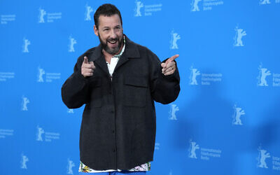 Adam Sandler poses for media at a photo-call for the movie 'Spaceman' during the International Film, Festival Berlinale, in Berlin, Wednesday, February 21, 2024. (AP Photo/Ebrahim Noroozi)