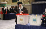 In this photo released by the office of the Iranian supreme leader, Supreme Leader Ayatollah Ali Khamenei casts his ballot during the parliamentary and Assembly of Experts elections in Tehran, Iran, Friday, March 1, 2024 (Office of the Iranian Supreme Leader via AP).