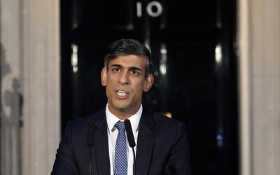 Britain's Prime Minister Rishi Sunak addresses the media at Downing Street in London, Friday, March 1, 2024. The Prime Minister used the address to warn that democracy is being targeted by extremists. (AP Photo/Alberto Pezzali)