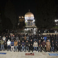 Muslim worshippers next to the Dome of Rock in the Temple Mount compound in the Old City of Jerusalem, March 10, 2024. (Mahmoud Illean/AP)
