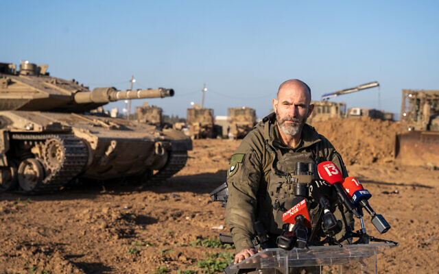 The commander of the 98th Division, Brig. Gen. Dan Goldfus, speaks to the press from the Gaza border, March 13, 2024. (Emanuel Fabian/Times of Israel)