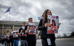 Israelis rally for the release of hostages held in Gaza, at the Knesset on March 4, 2024 (Yonatan Sindel/Flash90)
