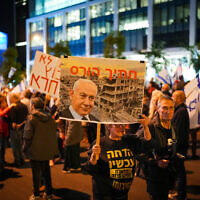 Israelis protest against Prime Minister Benjamin Netanyahu and the current Israeli government, in Tel Aviv, on March 23, 2024. (Photo by Erik Marmor/Flash90)