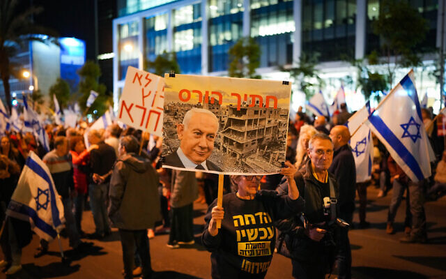 Israelis protest against Prime Minister Benjamin Netanyahu and the current Israeli government, in Tel Aviv, on March 23, 2024. (Photo by Erik Marmor/Flash90)