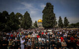 Thousands of Muslim worshipers attend Friday prayers during Ramadan, at the Al-Aqsa compound atop the Temple Mount in Jerusalem's Old City, March 29, 2024. (Jamal Awad/Flash90)