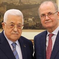 Palestinian Authority President Mahmoud Abbas (L) with Prime Minister-designate Mohammad Mustafa in Ramallah on March 14, 2024. (Wafa)