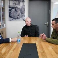 This handout photo shows Prime Minister Benjamin Netanyahu (L) Defense Minister Yoav Gallant (C) and IDF Chief of Staff Herzi Halevi meeting at the 'Bahad 1' military base in southern Israel, March 7, 2024. (Ariel Hermoni/Defense Ministry)