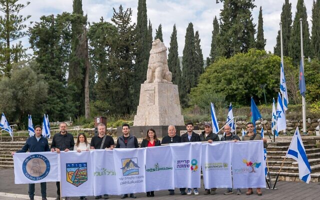 Nisan Zeevi, far right, with other Lobby 1701 members at a ceremony to commemorate the battle of Tel Hai in 1920 on March 21, 2024. (Courtesy)