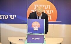Yesh Atid chairman and Opposition Leader Yair Lapid votes in his party's primary, March 28, 2024. (Elad Gutman(