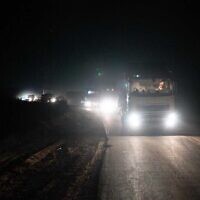 A UN aid convoy seen along a new military road used by the IDF that stretches from the border near the southern community of Be’eri to the coast of the Strip, March 11, 2024. (Israel Defense Forces)