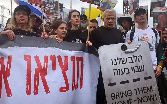 Lapid to hostages' families: If we were doing enough, hostages would ...