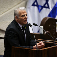 Opposition Leader Yair Lapid addresses the Knesset plenum, April 15, 2024. (Noam Moskowitz, Office of the Knesset Spokesperson)