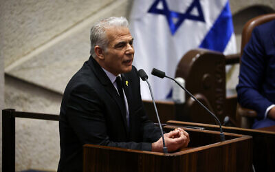 File - Opposition Leader Yair Lapid addresses the Knesset plenum, April 15, 2024. (Noam Moskowitz, Office of the Knesset Spokesperson)