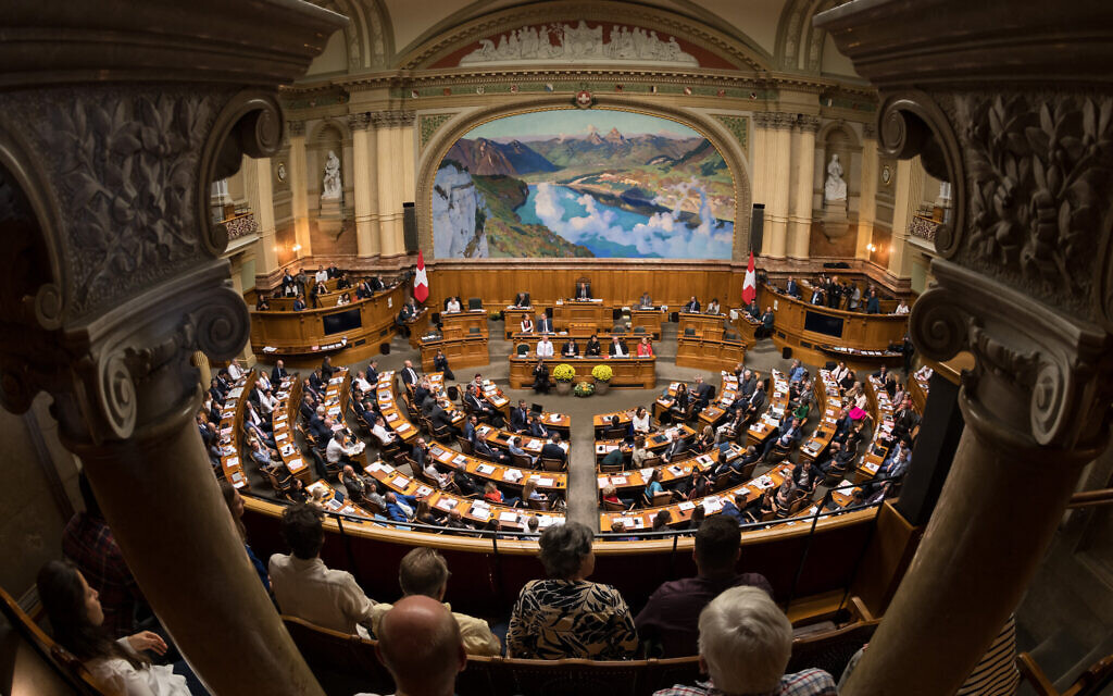 Swiss lawmakers vote to ban Nazi symbols including flags, gestures and speech