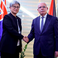 File - Palestinian Foreign Minister Riyad al-Maliki (R) receives Australian Foreign Minister Penny Wong (L), in Palestinian Authority-controlled Ramallah, in the West Bank, January 17, 2024. (Jaafar Ashtiyeh/AFP)