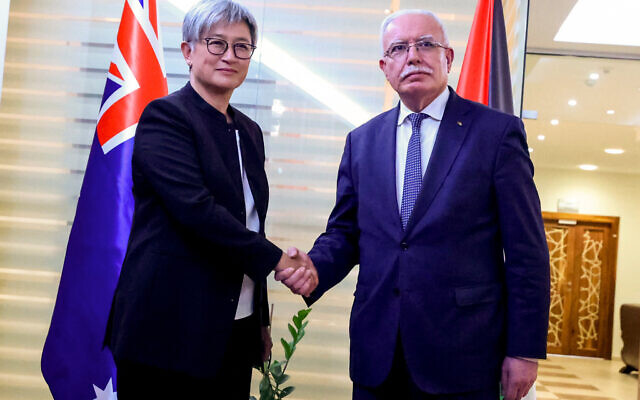 File - Palestinian Foreign Minister Riyad al-Maliki (R) receives Australian Foreign Minister Penny Wong (L), in Palestinian Authority-controlled Ramallah, in the West Bank, January 17, 2024. (Jaafar Ashtiyeh/AFP)