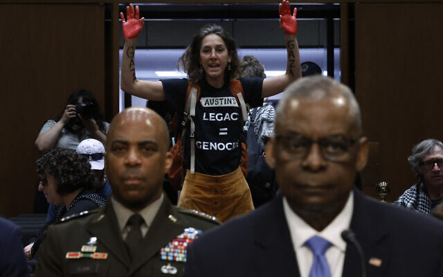Protesters interrupted Secretary of Defense Lloyd Austin as he testified before the Senate Armed Services Committee in the Hart Senate Office Building on Capitol Hill on April 09, 2024 in Washington, DC. (Chip Somodevilla/Getty Images North America/Getty Images via AFP)