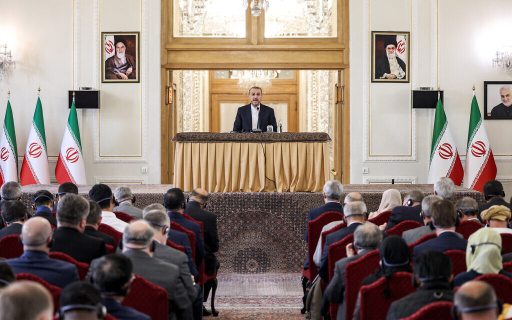 Iranian Foreign Minister Hossein Amir-Abdollahian (C) briefs the press at his headquarters in Tehran on April 14, 2024 after launching hundreds of attack drones and missiles at Israel overnight. (Atta Kenare/AFP)