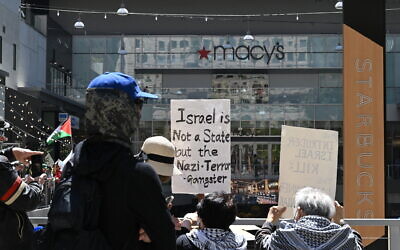Demonstrators take over a shopping center during a 'Strike for Gaza' protest calling for a permanent ceasfire in the Israel-Hamas conflict on April 15, 2024, in Los Angeles, California. (Robyn BECK / AFP)