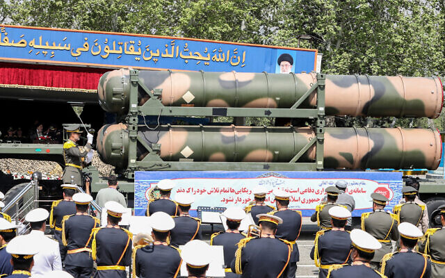 An Iranian military truck carries parts of an S-300 air defence missile system during a military parade as part of a ceremony marking the country's annual army day, in Tehran on April 17, 2024. (ATTA KENARE / AFP)