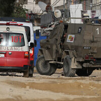 A Palestinian ambulance is seen in the West Bank on April 20, 2024. (Photo by Zain JAAFAR / AFP)