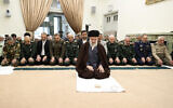 Iran's Supreme Leader Ayatollah Ali Khamenei leading prayers with a group commanders of the Iranian armed forces in Tehran, on on April 21, 2024. (KHAMENEI.IR / AFP)