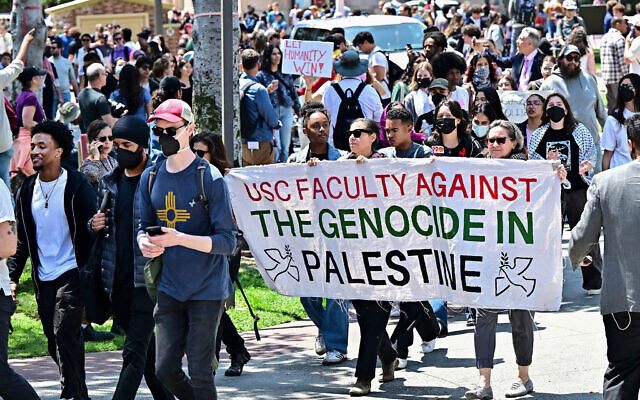 Faculty join pro-Palestinian and anti-Israel students at the University of Southern California in Los Angeles, on April 24, 2024. (Frederic J. Brown/AFP)