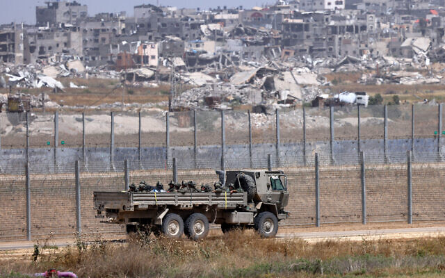 This picture taken from Israel's southern border with the Gaza Strip shows an Israeli military vehicle along the border with the Palestinian enclave on April 24, 2024. (Jack Guez / AFP)