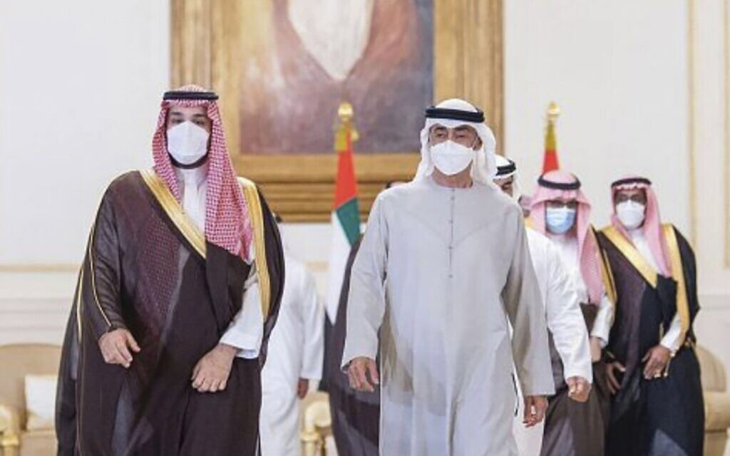 Saudi Crown Prince Mohammed bin Salman, left, arrives in Abu Dhabi to offer condolences to Sheikh Mohammed bin Zayed Al Nahyan, president of the UAE and ruler of Abu Dhabi, third, right, on the passing of Sheikh Khalifa bin Zayed Al Nahyan, the late president of the UAE, at the Presidential Airport in Abu Dhabi, United Arab Emirates, May 16, 2022. (Saudi Press Agency via AP)
