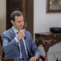 Syrian President Bashar Assad speaking during an interview in Damascus, Syria, on August 9, 2023. (Syrian Presidency Telegram page via AP)