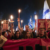 Israelis protest in Jerusalem against Prime Minister Benjamin Netanyahu's government and for the release of the hostages on April 2, 2024. (AP Photo/Ohad Zwigenberg)