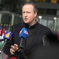 British Foreign Secretary David Cameron speaks with the media as he arrives for a meeting of NATO foreign ministers at NATO headquarters in Brussels, April 3, 2024. Virginia Mayo/AP)