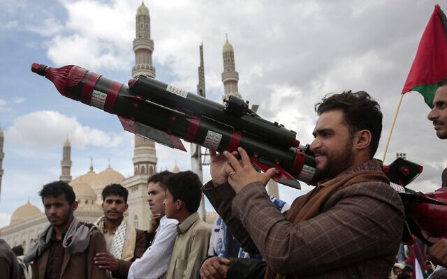 Illustrative: A Houthi supporter holds a mock missile during a Jerusalem Day protest in support of Palestinians in the Gaza Strip, in Sanaa, Yemen, April 5, 2024. (AP Photo/Osamah Abdulrahman)