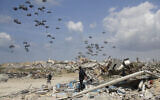 Humanitarian aid is airdropped to Palestinians over Gaza City, Gaza Strip, March 25, 2024. (AP Photo/Mahmoud Essa)