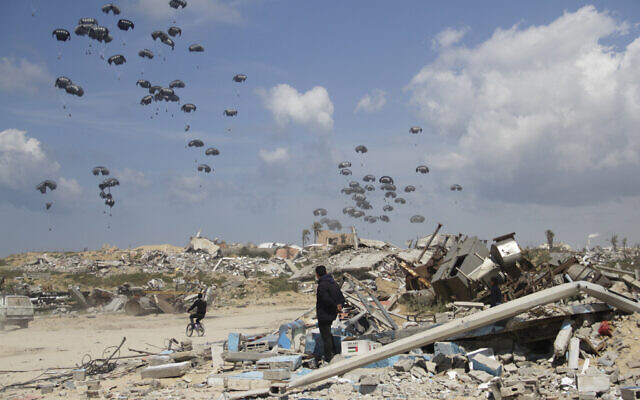 Humanitarian aid is airdropped to Palestinians over Gaza City, Gaza Strip, March 25, 2024. (AP Photo/Mahmoud Essa)
