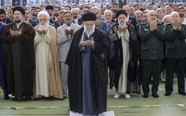 Iranian Supreme Leader Ayatollah Ali Khamenei leads Eid al-Fitr prayer marking the end of the Muslim holy fasting month of Ramadan, in Tehran, Iran, Wednesday, April 10, 2024. (Office of the Iranian Supreme Leader via AP)