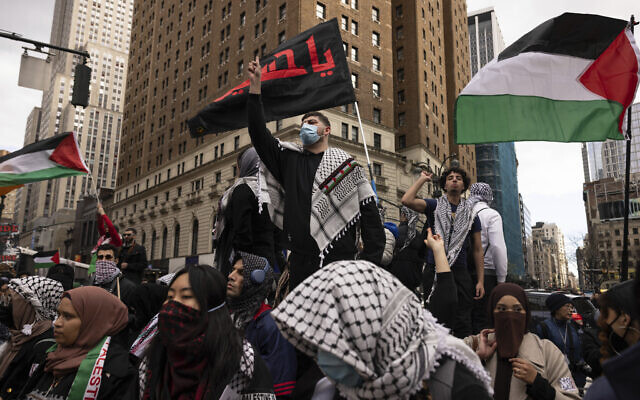 Pro-Palestinian demonstrators chant during a protest, April. 12, 2024, in New York. (AP Photo/Yuki Iwamura)