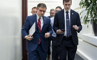 House Speaker Mike Johnson, R-La., left, arrives for a closed-door meeting with fellow Republicans at the Capitol in Washington, Monday, April 15, 2024. (AP/J. Scott Applewhite)
