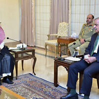 Visiting Saudi Foreign Minister Prince Faisal bin Farhan, left, listens to Pakistan's Prime Minister Shehbaz Sharif during a meeting in Islamabad, Pakistan, April 16, 2024. (Prime Minister Office via AP)