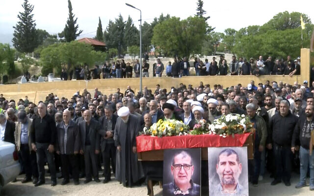 In this grab taken from video, mourners pray over the coffin of Lebanese money changer Mohammad Srour, 57, who was found killed inside a villa in Beit Meri, during his funeral procession in Labweh village, near the border with Syria, northeast Lebanon, Thursday, April 11, 2024. (Photo)