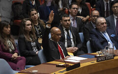 US Deputy Ambassador Robert Wood votes against a resolution that would have recognized the Palestinians as a full UN member state, during a Security Council meeting at United Nations headquarters, Thursday, April 18, 2024. (AP Photo/Yuki Iwamura)