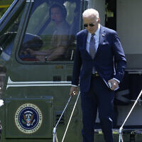 US President Joe Biden steps off of Marine One on the South Lawn of the White House in Washington, April 26, 2024, as he returns from a trip to New York. (AP Photo/Susan Walsh)
