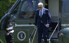 US President Joe Biden steps off of Marine One on the South Lawn of the White House in Washington, April 26, 2024, as he returns from a trip to New York. (AP Photo/Susan Walsh)