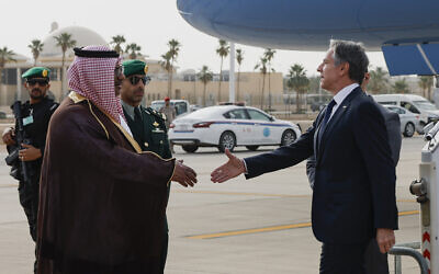 US Secretary of State Antony Blinken is welcomed by Saudi Foreign Ministry Director of Protocol Affairs Mohammed Al-Ghamdi as he arrives in Riyadh, Saudi Arabia, Monday, April 29, 2024. (Evelyn Hockstein/Pool Photo via AP)