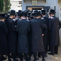 Ultra-Orthodox Jews arrive to the IDF Recruitment Center at Tel Hashomer, in central Israel, March 28, 2024. (Avshalom Sassoni/Flash90)