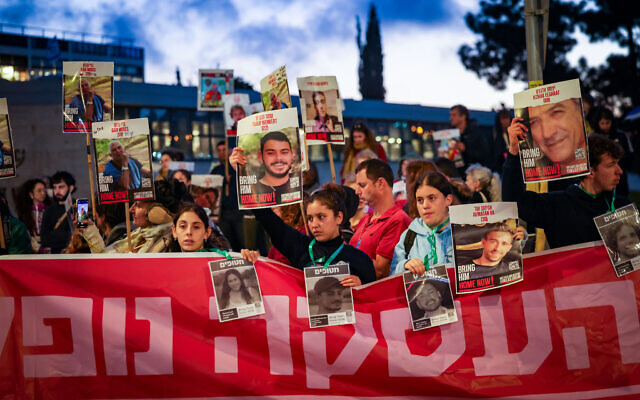 Families of Israelis held hostage by Hamas terrorists in the Gaza Strip and their supporters call for a deal to release the captives, outside the Prime Minister's Office in Jerusalem, April 9, 2024. (Chaim Goldberg/Flash90)