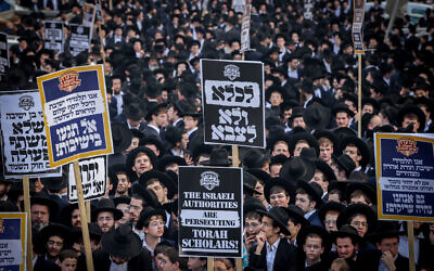 Ultra-Orthodox men protest against the IDF draft in Jerusalem, April 11, 2024. (Yonatan Sindel/Flash90)
