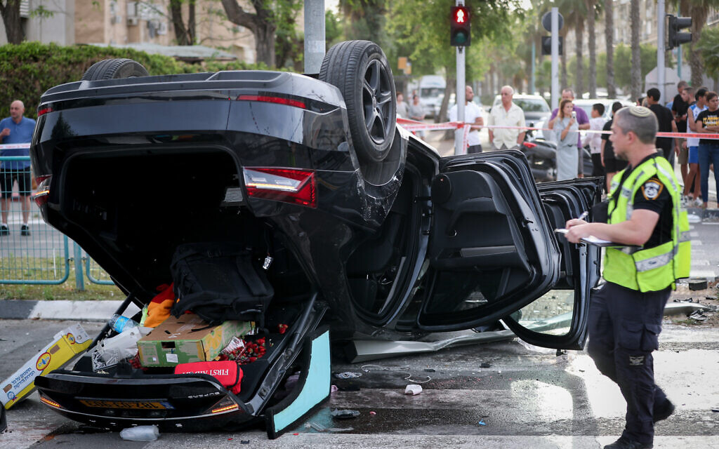 Ben Gvir’s car flips over after running red light, minister lightly injured